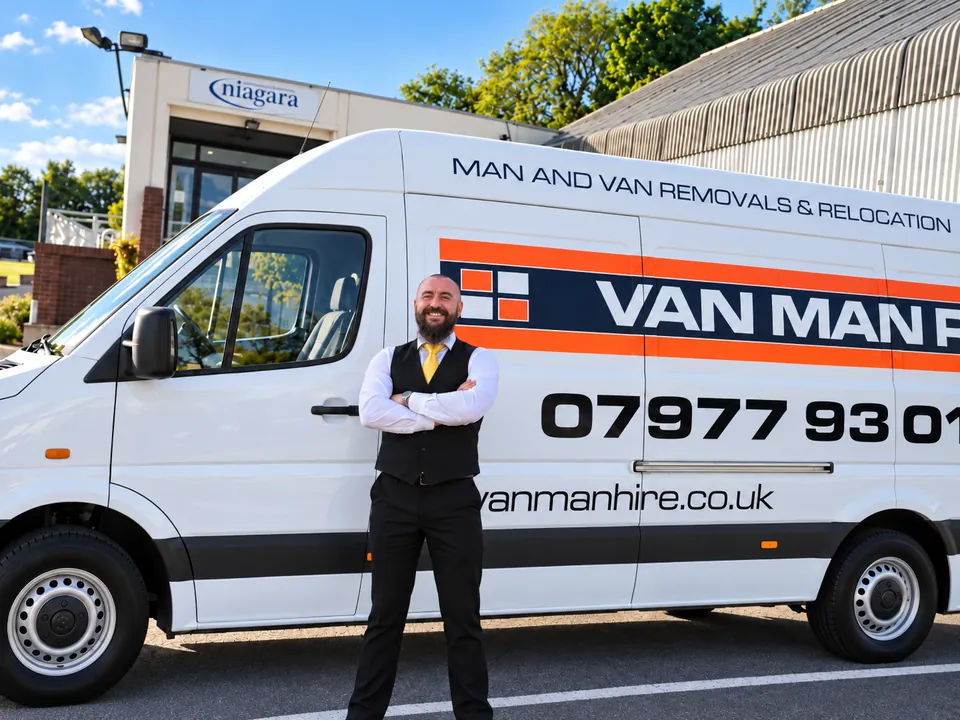 Van Man Hire Sheffield | Man and van and house removals Mark Ravenhill beside a branded Van Man Hire removals van in Sheffield